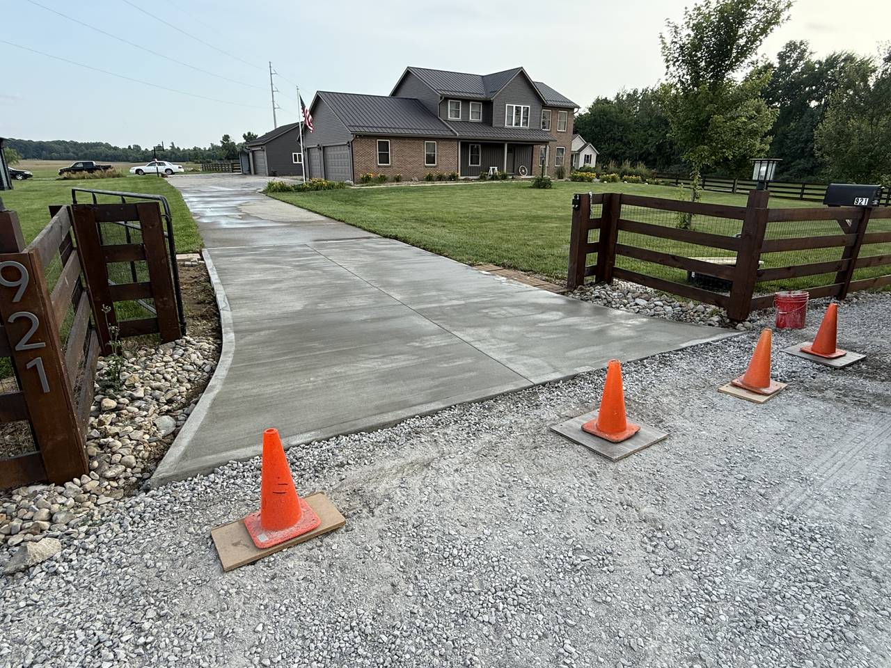 Curved concrete driveway at a rural property