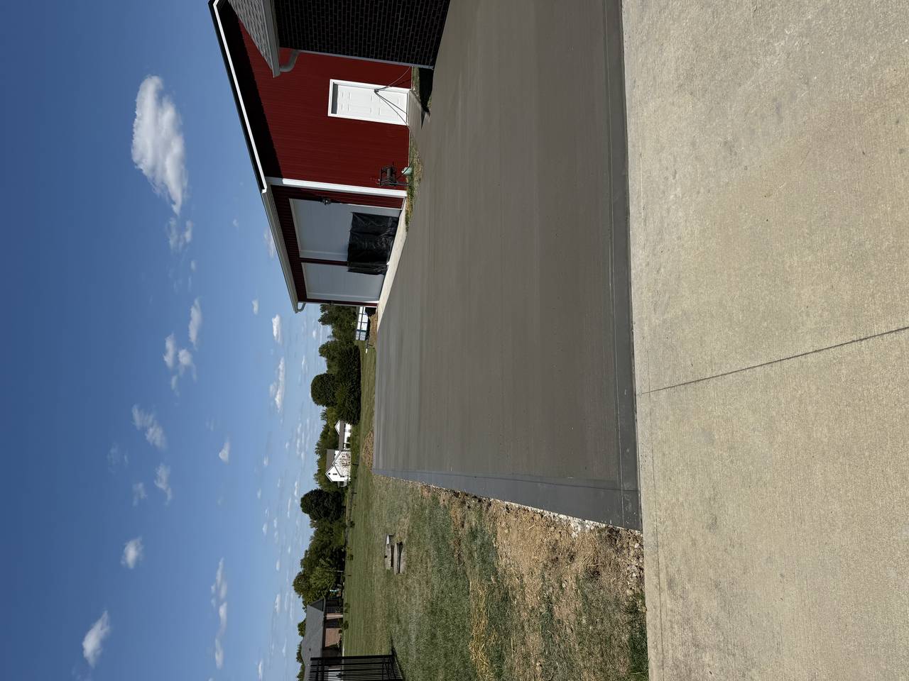 Concrete driveway extension next to pole barn, Ashville, Ohio