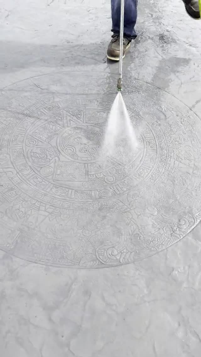 Custom hand-carved stamped concrete design