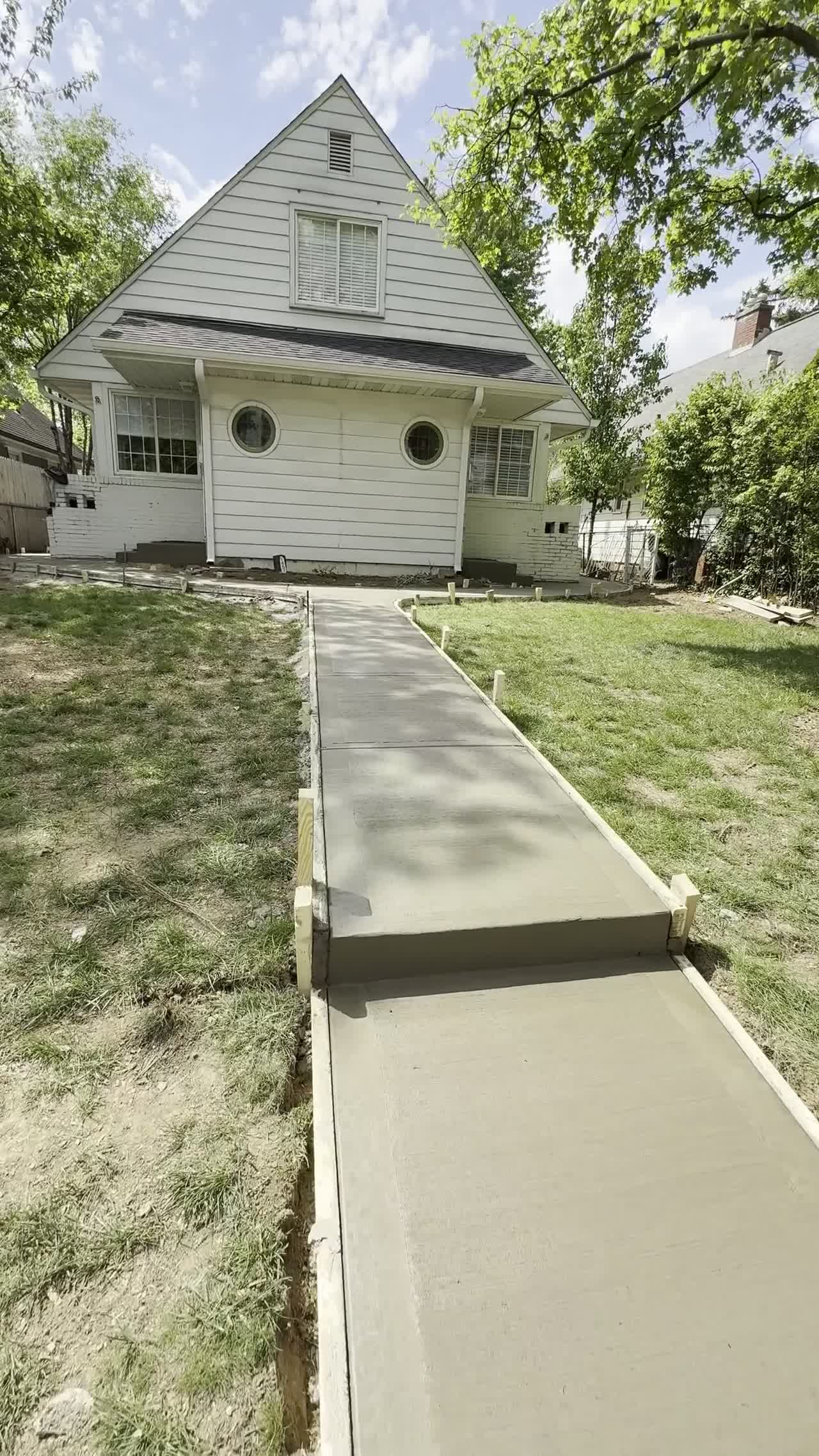 Concrete walkway to a home